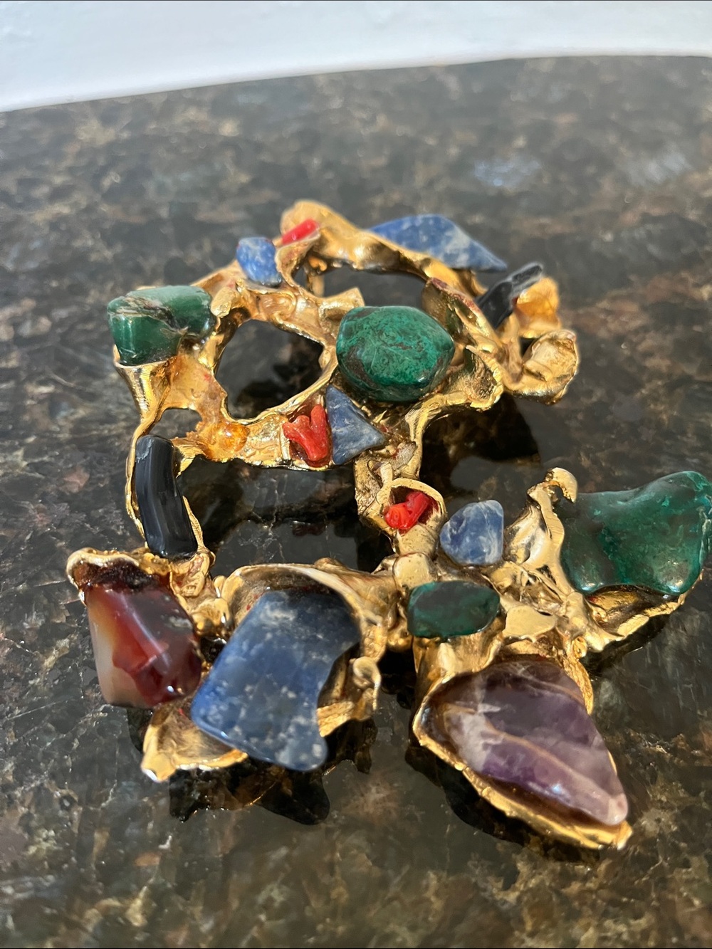 Modernist gold tone pendent or broach set with semi precious stones